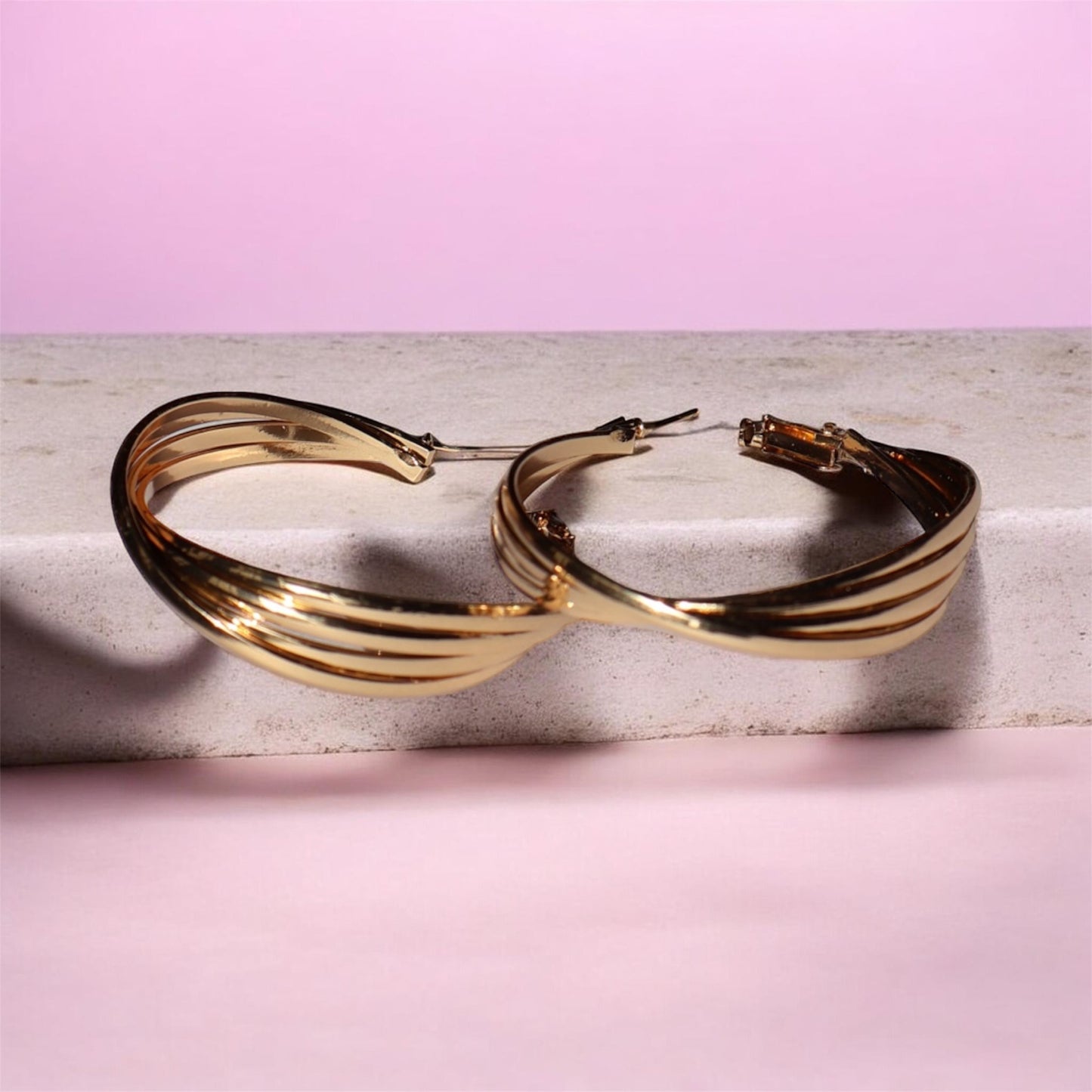 Twisted Triple Hoops